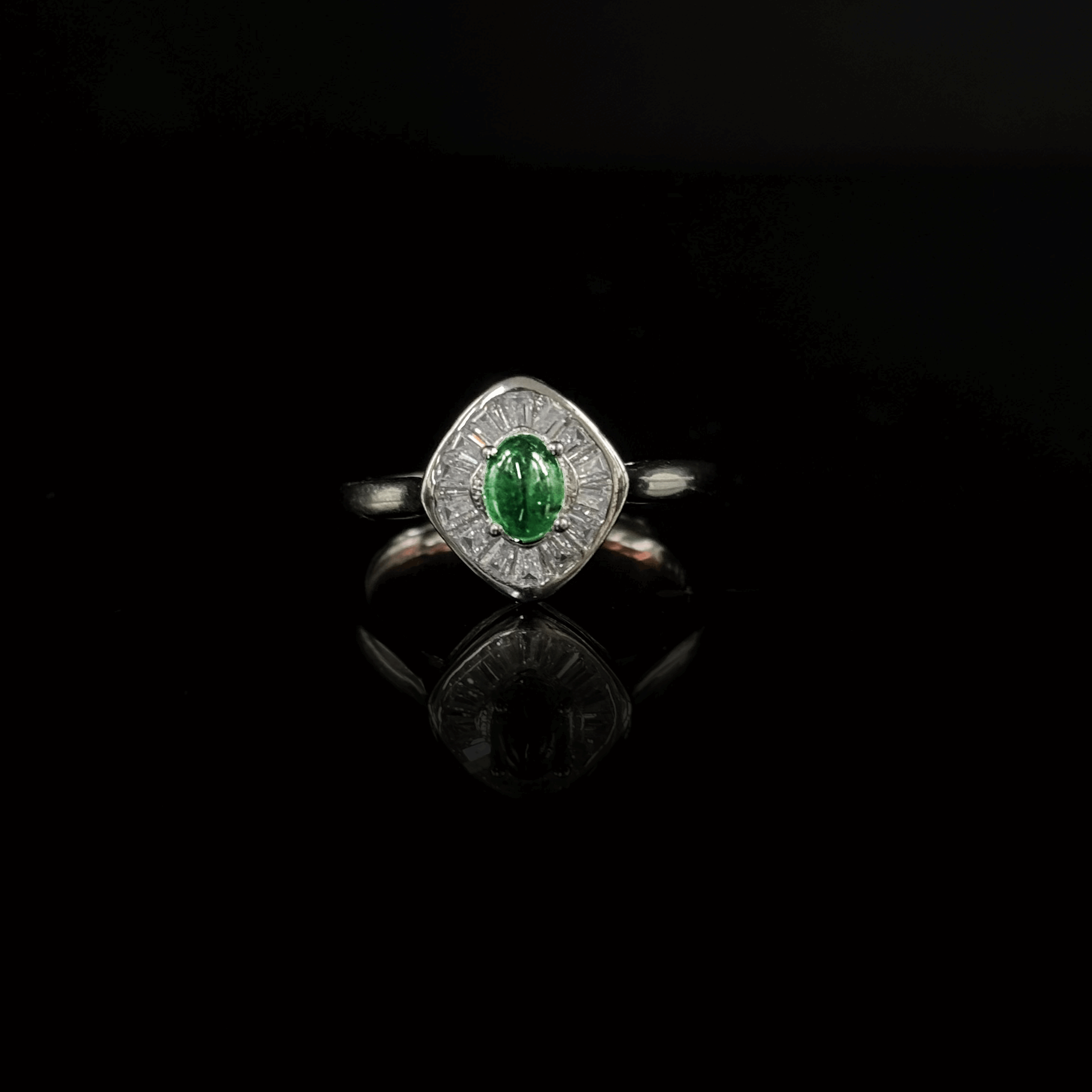 #127 Emerald ring in silver